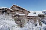 Experience luxury living in this stunning chalet nestled in a winter wonderland.