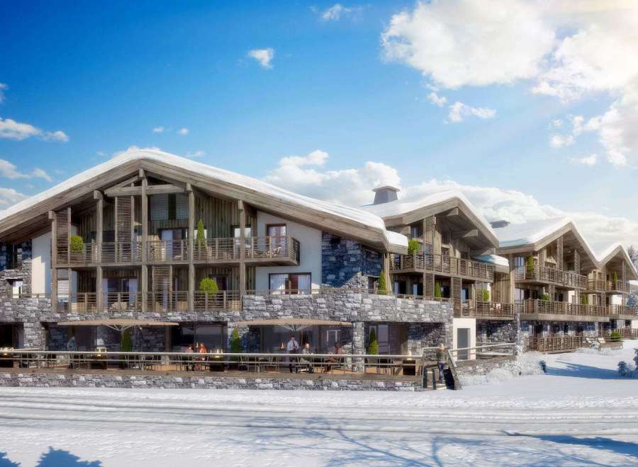Experience luxury in this stunning ski chalet, featuring a beautiful stone facade and wooden accents.