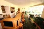 Step into a cozy bar area, perfect for relaxation and socializing.