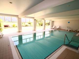 Enjoy a relaxing swim in this indoor pool, perfect for any time of year.