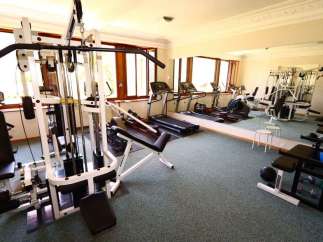 This well-equipped gym offers a variety of workout options, including treadmills and weight machines.