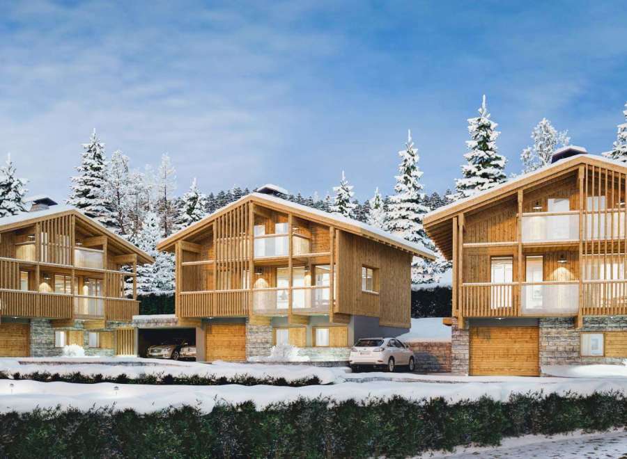 Discover the charm of these stunning wooden chalets nestled in a winter wonderland.