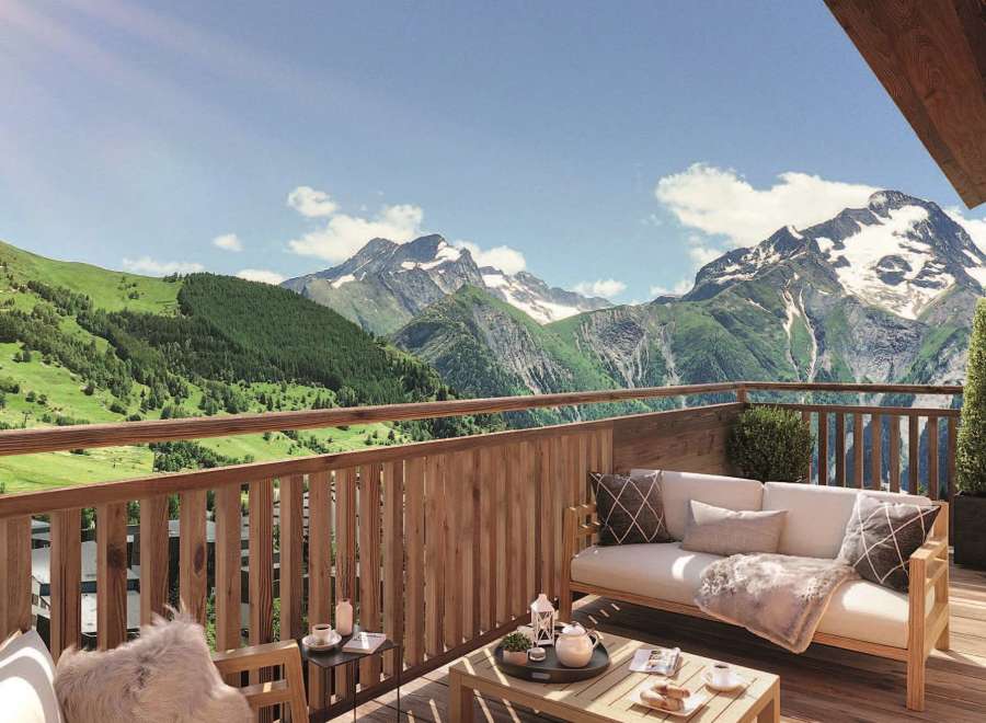 Experience breathtaking mountain views from this luxurious balcony.