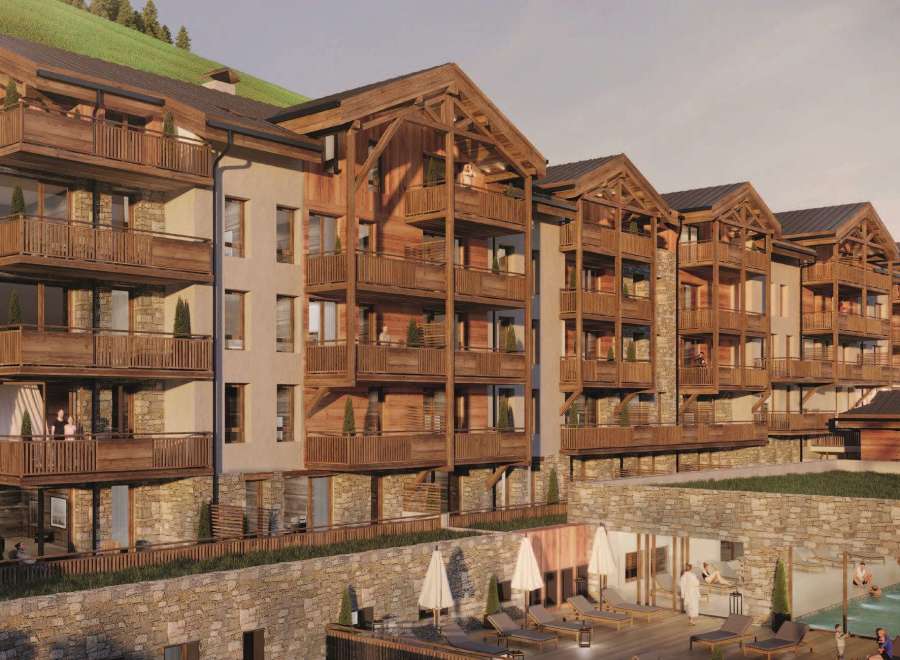 Experience luxury living in this stunning property featuring exquisite wooden balconies and a charming stone facade.
