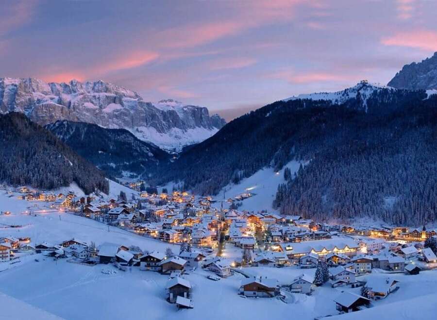 Experience the magic of a snow-covered village nestled in the heart of the mountains.