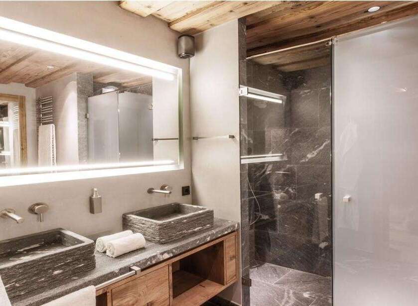 Experience luxury in this stunning bathroom featuring a sleek, modern design.