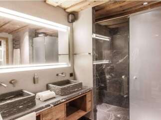 Experience luxury in this stunning bathroom featuring a sleek, modern design.