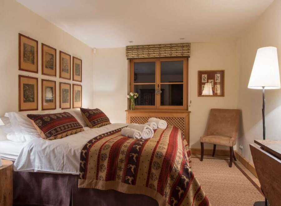 Cozy bedroom with rustic charm.