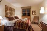 Cozy bedroom with rustic charm.