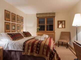 Cozy bedroom with rustic charm.