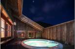 Enjoy a relaxing evening under the stars in this luxurious hot tub.