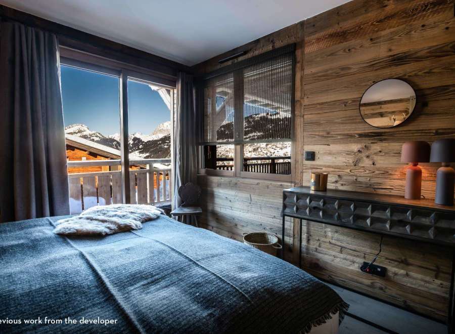 Experience the ultimate alpine retreat in this stunning bedroom.