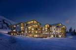 Experience luxury in this stunning mountain lodge, perfect for a winter getaway.