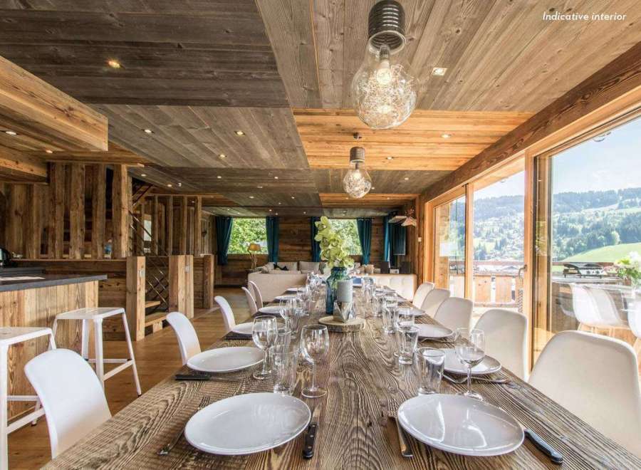 Experience luxury living in this stunning property, featuring a beautifully designed dining area perfect for entertaining.