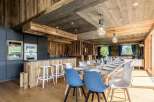 Experience rustic elegance in this stunning property, showcasing exquisite wooden interiors and a warm, inviting atmosphere.
