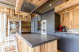 Experience rustic elegance in this stunning kitchen.