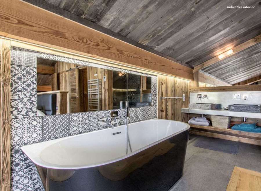 Experience rustic luxury in this stunning bathroom.