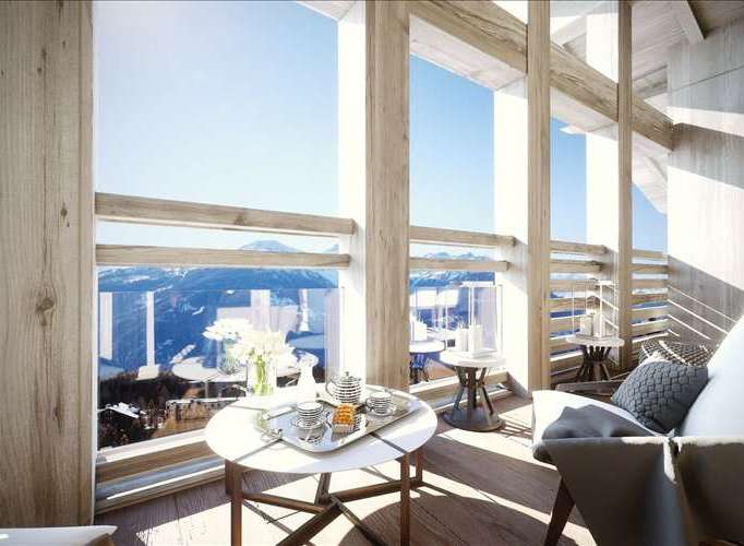Enjoy breathtaking mountain views from this stunning balcony.