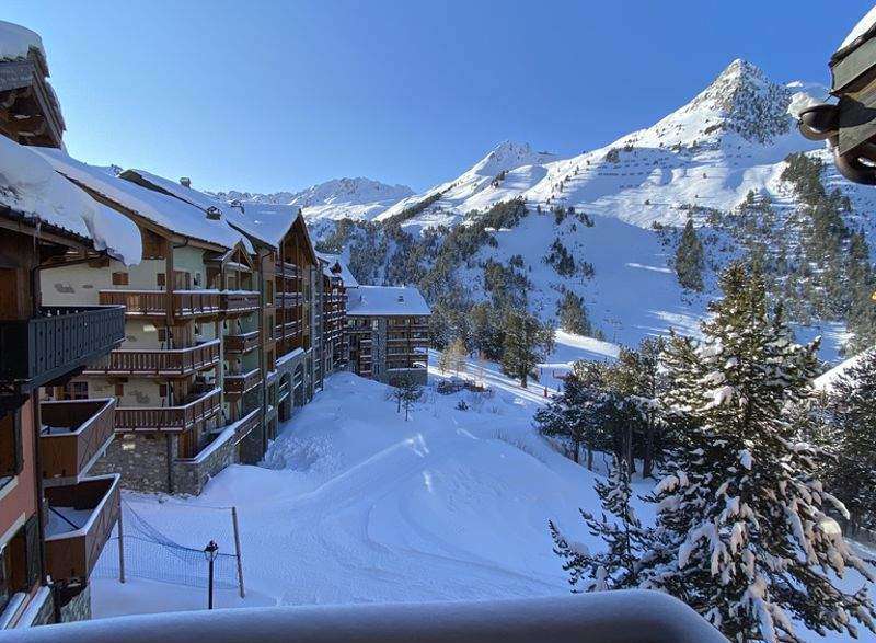 Enjoy breathtaking mountain views from this cozy ski chalet.