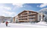 Discover your dream ski-in/ski-out chalet! This stunning property boasts modern architecture with spacious balconies, perfect for enjoying breathtaking mountain views.