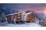 Discover your dream alpine retreat! This stunning property boasts modern architecture with a warm, inviting ambiance.