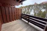 Enjoy breathtaking mountain views from this charming balcony.