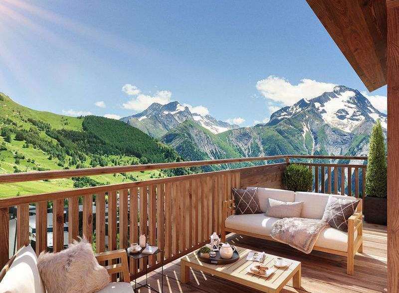Enjoy breathtaking mountain views from this stunning balcony.