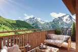 Enjoy breathtaking mountain views from this stunning balcony.
