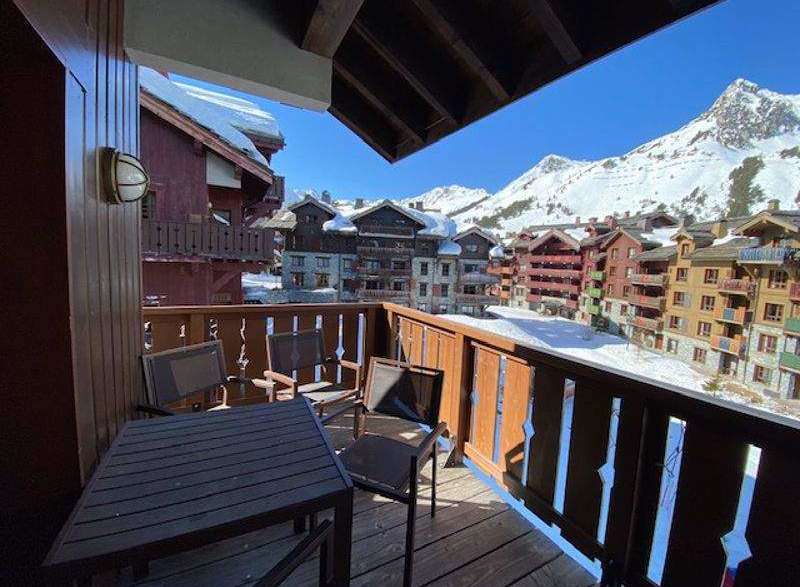 Enjoy breathtaking mountain views from this charming balcony.