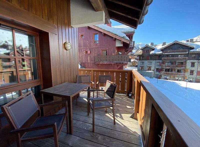 Enjoy stunning mountain views from this charming balcony.