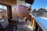 Enjoy stunning mountain views from this charming balcony.