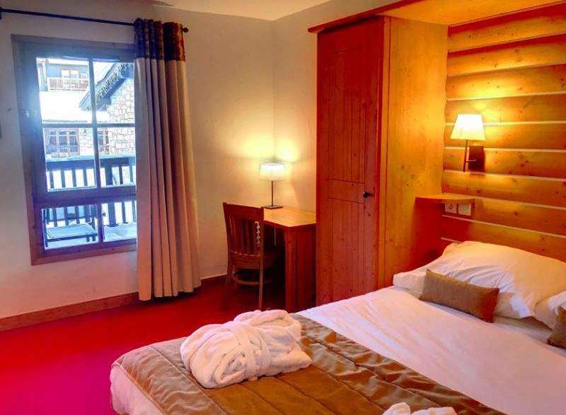 Cozy hotel room with a warm and inviting atmosphere.