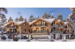 Discover "Les Terrasses du Champelet", a stunning property nestled in a winter wonderland.
