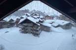 Experience the ultimate winter getaway in this stunning property nestled in a snowy landscape.