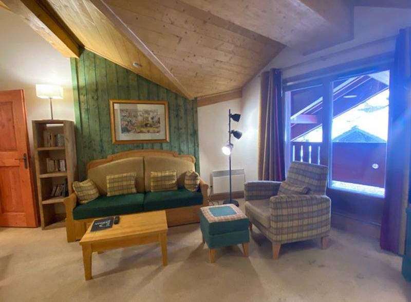 Cozy living space with a charming, rustic aesthetic.
