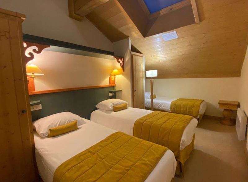 Discover a cozy and inviting bedroom with a unique architectural design.