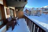 Enjoy breathtaking mountain views from this charming balcony.