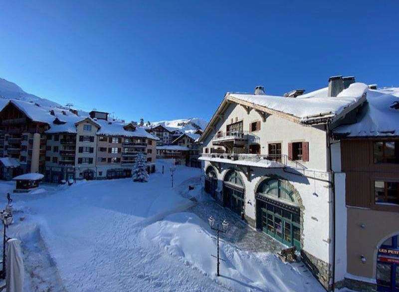Experience the charm of this snow-covered property, perfect for a winter getaway.
