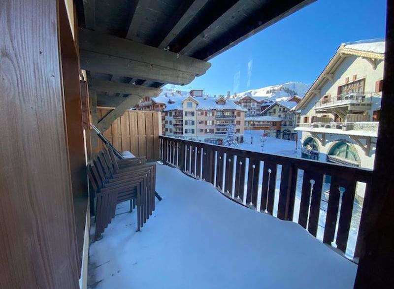 Enjoy breathtaking mountain views from this charming balcony.