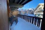 Enjoy breathtaking mountain views from this charming balcony.