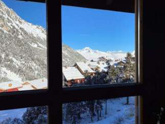 Enjoy breathtaking mountain views from this cozy property.