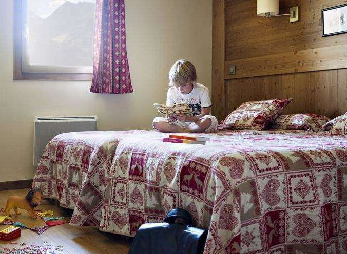Cozy up in this charming bedroom, perfect for a relaxing getaway.
