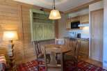 Cozy apartment with a charming dining area, perfect for enjoying meals.