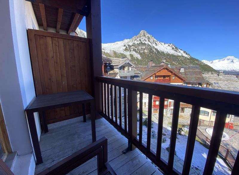 Enjoy breathtaking mountain views from this charming balcony.