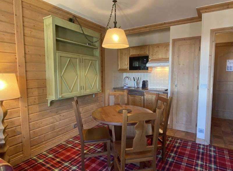 Cozy apartment with a charming dining area.