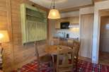 Cozy apartment with a charming dining area.