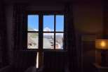 Enjoy breathtaking mountain views from this cozy property.