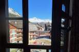 Enjoy breathtaking mountain views from this charming property.