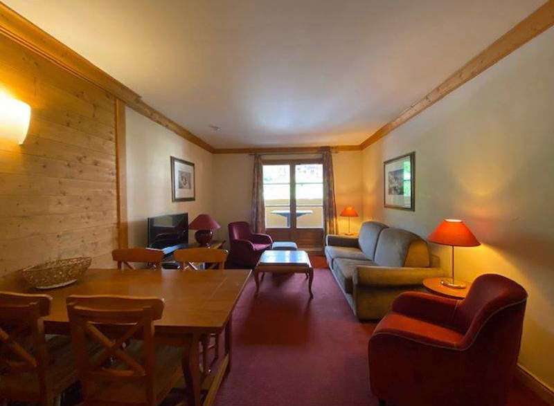 Cozy living space with a dining area, perfect for relaxing and entertaining.