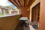 Enjoy stunning mountain views from this charming balcony.